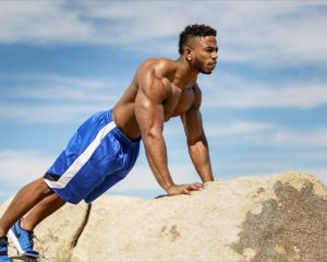 Dywane Pushup on a Rock in the Desert